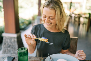 Here’s a somatic practice for reconnecting with nourishment: The next time you eat, try slowing down for just one minute before your first bite.